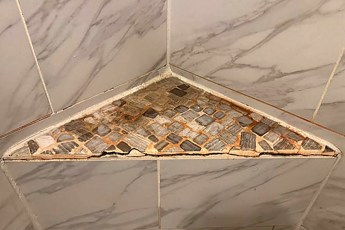 Shower and tile before restoration cleaning